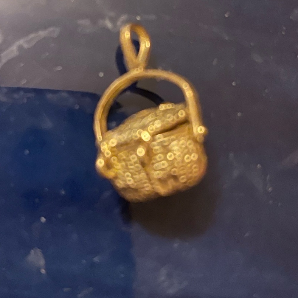 14k fully functional basket pendant. Solid 14k no damage.